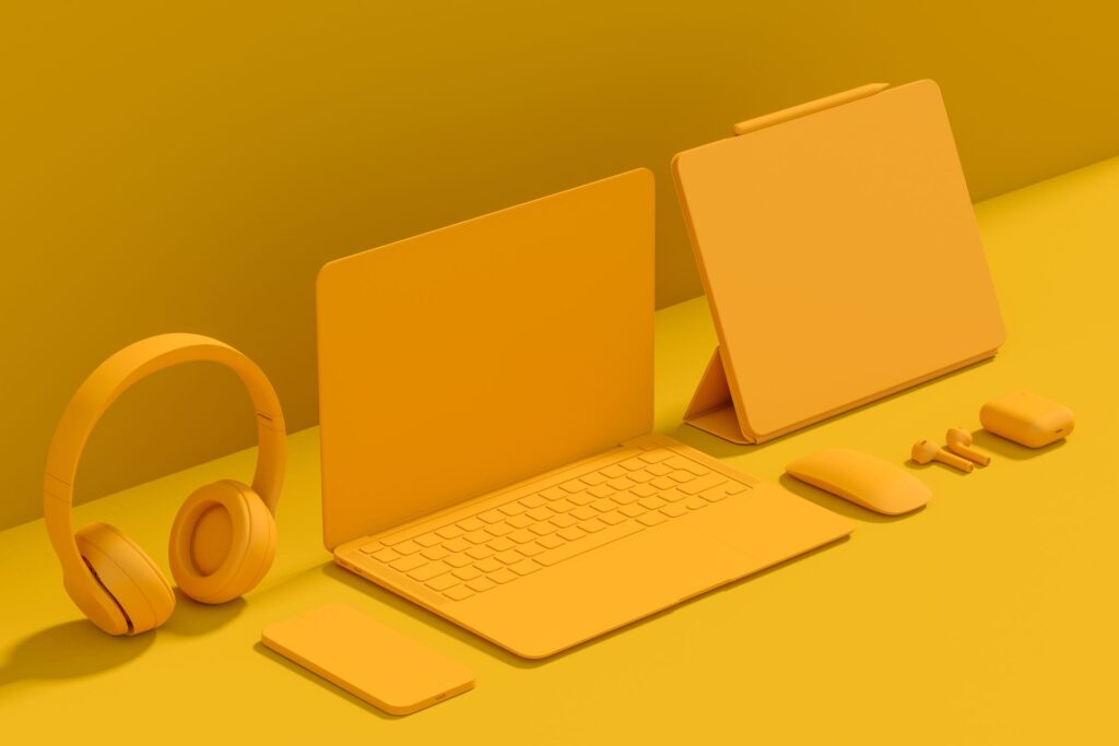 Technik-Check 4 Aluminum laptop with graphic tablet, mouse, headphones and phone on monochrome